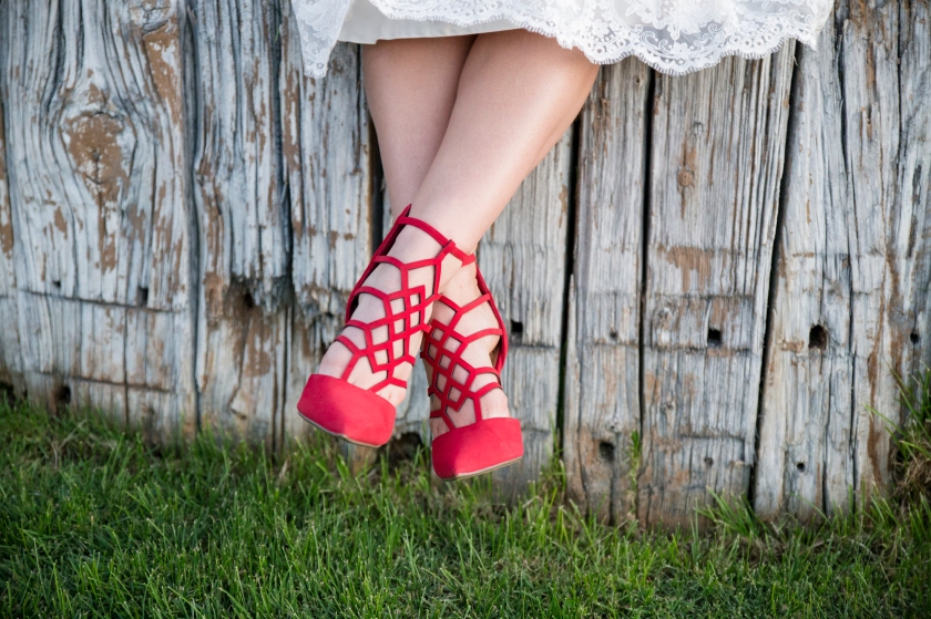 wedding planning design decor inspo real local New Mexico Perfect Wedding Guide couple bright color blue orange red hot air balloon love heels red shoes bridal lace details natural rustic greenery outdoor
